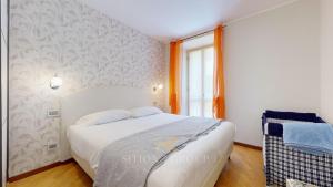 A bed or beds in a room at SYC Favoloso