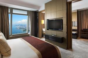 A television and/or entertainment centre at The Ritz-Carlton, Hong Kong