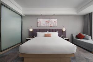 Mehood Lestie International Hotel Linhexi Guangzhou East Railway Station Branch - Free Shuttle Bus to Canton Fair Complex During Canton Fair Period & Free afternoon tea & Free midnight snack & Free VPN Internet Access客房内的一张或多张床位