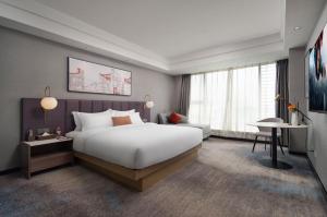 Mehood Lestie International Hotel Linhexi Guangzhou East Railway Station Branch - Free Shuttle Bus to Canton Fair Complex During Canton Fair Period & Free afternoon tea & Free midnight snack & Free VPN Internet Access客房内的一张或多张床位