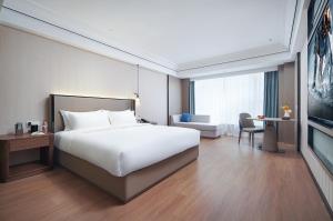 Mehood Lestie International Hotel Linhexi Guangzhou East Railway Station Branch - Free Shuttle Bus to Canton Fair Complex During Canton Fair Period & Free afternoon tea & Free midnight snack & Free VPN Internet Access客房内的一张或多张床位