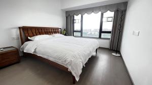 Peicui Apartment客房内的一张或多张床位