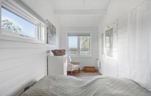 Voodi või voodid majutusasutuse Pet Friendly Home In Bogø By With Wifi toas
