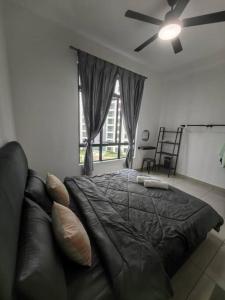 a bedroom with a bed and a ceiling fan at 3R2B KSL2 Midvalley Southkey Ikea Toppen Aeon in Johor Bahru +18 photos