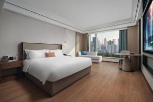 Mehood Lestie International Hotel Linhexi Guangzhou East Railway Station Branch - Free Shuttle Bus to Canton Fair Complex During Canton Fair Period & Free afternoon tea & Free midnight snack & Free VPN Internet Access客房内的一张或多张床位