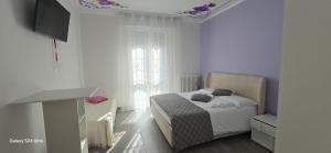 Postel nebo postele na pokoji v ubytování Orchidea + 63 fotografií