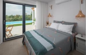 Ένα ή περισσότερα κρεβάτια σε δωμάτιο στο 3 Bedroom Pet Friendly Home In Krmed