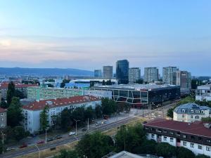 a view of a city with buildings and a street at Skyline Flat near City Center by Richies in Bratislava