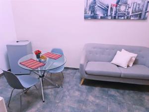 Et opholdsområde på Misti Apartment Hostal