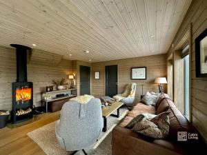 Χώρος καθιστικού στο High standard cabin at Sjusjøen sauna, hot tub & ski trails right outside