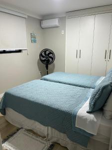 Ap Cozy Calhau prox PRAIA客房内的一张或多张床位