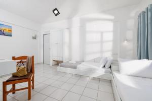 Postel nebo postele na pokoji v ubytování Kings Hersonissos Hotel