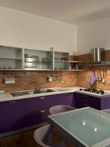 Kuchyň nebo kuchyňský kout v ubytování Casa Miglionico