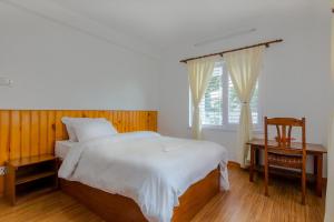 Postel nebo postele na pokoji v ubytování Lemon Tree Apartment