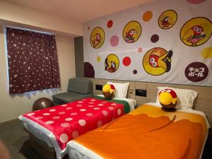 Postel nebo postele na pokoji v ubytování Henn na Hotel Tokyo Nishikasai