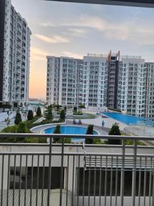 a view of a city with tall buildings at Cozy FamiLee Homestay in Simpang Ampat