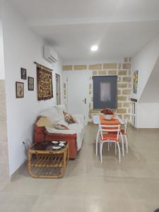 Χώρος καθιστικού στο Apartamentos las palmeras