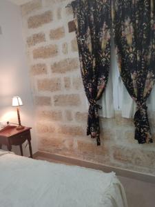 Ένα ή περισσότερα κρεβάτια σε δωμάτιο στο Apartamentos las palmeras +6 φωτογραφίες