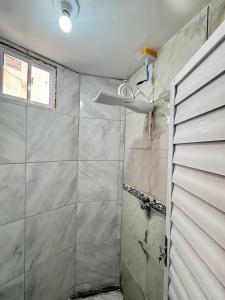 Koupelna v ubytování Ap próximo ao Arco com garagem e ar