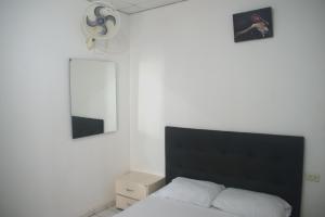 Postel nebo postele na pokoji v ubytování Hosting and Travel Services 420