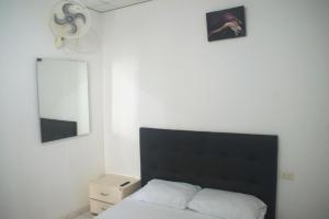 Postel nebo postele na pokoji v ubytování Hosting and Travel Services 420