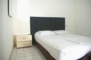 Postel nebo postele na pokoji v ubytování Hosting and Travel Services 420