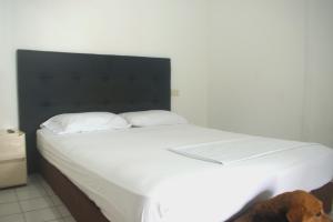 Postel nebo postele na pokoji v ubytování Hosting and Travel Services 420