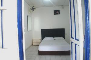 Postel nebo postele na pokoji v ubytování Hosting and Travel Services 420