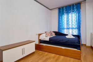 Postel nebo postele na pokoji v ubytování Experiencia Vacacional Mondariz
