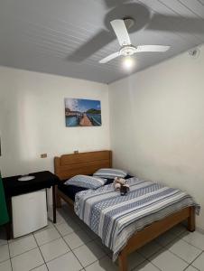 Postel nebo postele na pokoji v ubytování Pouso da Celeste - Trindade