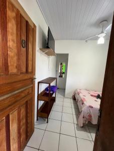Postel nebo postele na pokoji v ubytování Pouso da Celeste - Trindade