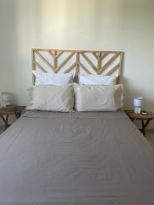 Posteľ alebo postele v izbe v ubytovaní Appartement avec vue sur mer