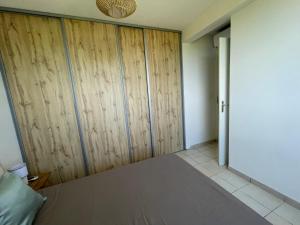 Posteľ alebo postele v izbe v ubytovaní Appartement avec vue sur mer
