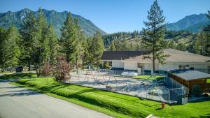 an aerial view of a playground in front of a house at RidgeView Resort in Radium Hot Springs