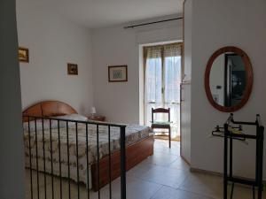 Postel nebo postele na pokoji v ubytování Ormea nel cuore