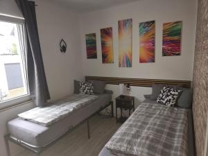 Krevet ili kreveti u jedinici u okviru objekta Zimmer mit eigenem Bad in Heidelberg
