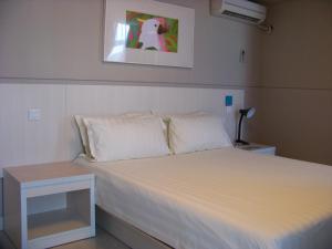 Voodi või voodid majutusasutuse Jinjiang Inn - Shenzhen Airport toas