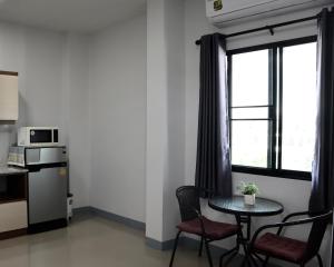 Η κουζίνα ή μικρή κουζίνα στο Aree Place Chiang Mai