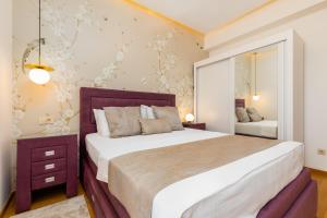 Apart hotel M S KATUNJANIN客房内的一张或多张床位