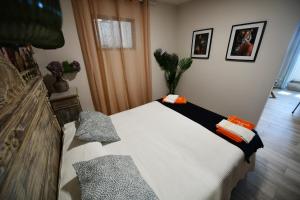 Postel nebo postele na pokoji v ubytování Casa karrikaburu