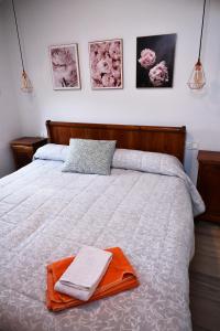 Postel nebo postele na pokoji v ubytování Casa karrikaburu