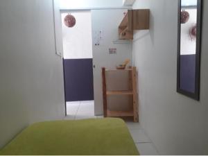 Postel nebo postele na pokoji v ubytování Pousada Boneca de Pano