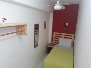 Postel nebo postele na pokoji v ubytování Pousada Boneca de Pano