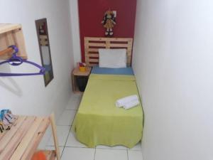 Postel nebo postele na pokoji v ubytování Pousada Boneca de Pano