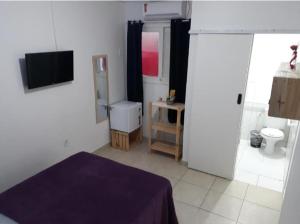 Koupelna v ubytování Pousada Boneca de Pano