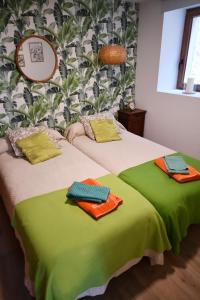 Postel nebo postele na pokoji v ubytování Casa karrikaburu