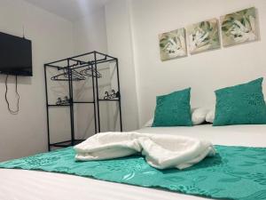 Postel nebo postele na pokoji v ubytování Shekinah House