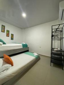 Postel nebo postele na pokoji v ubytování Shekinah House