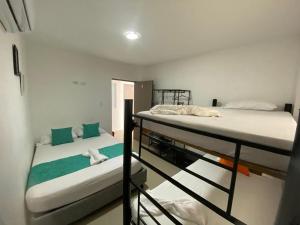 Postel nebo postele na pokoji v ubytování Shekinah House