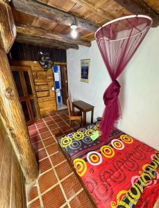 Hostal Nibuni Palomino客房内的一张或多张床位